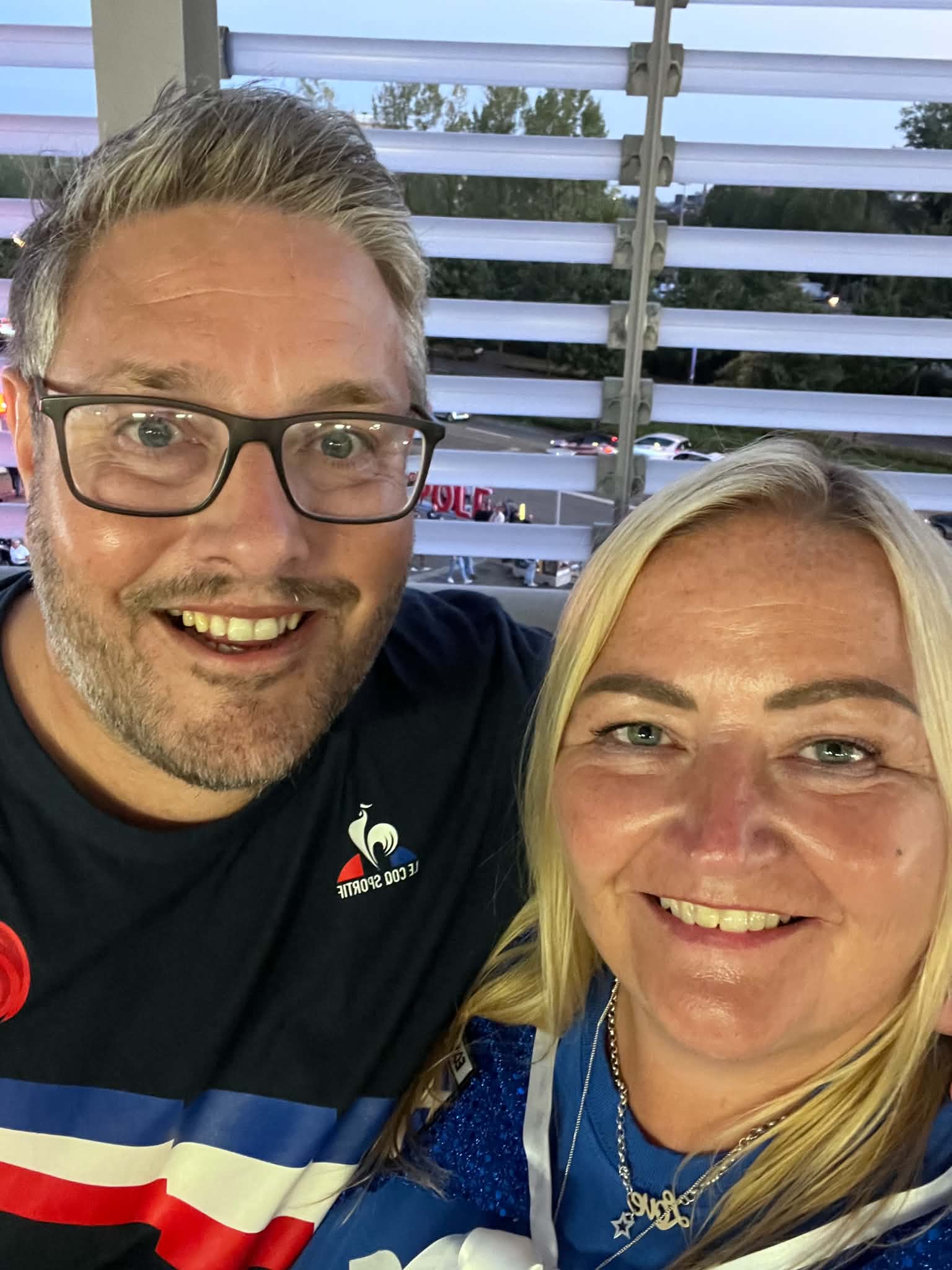 Neil and Carolanne smiling together at an event